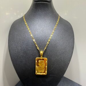 Begagnad Halsband i 21K guld kombineras med en guldtacka i 24K 10g