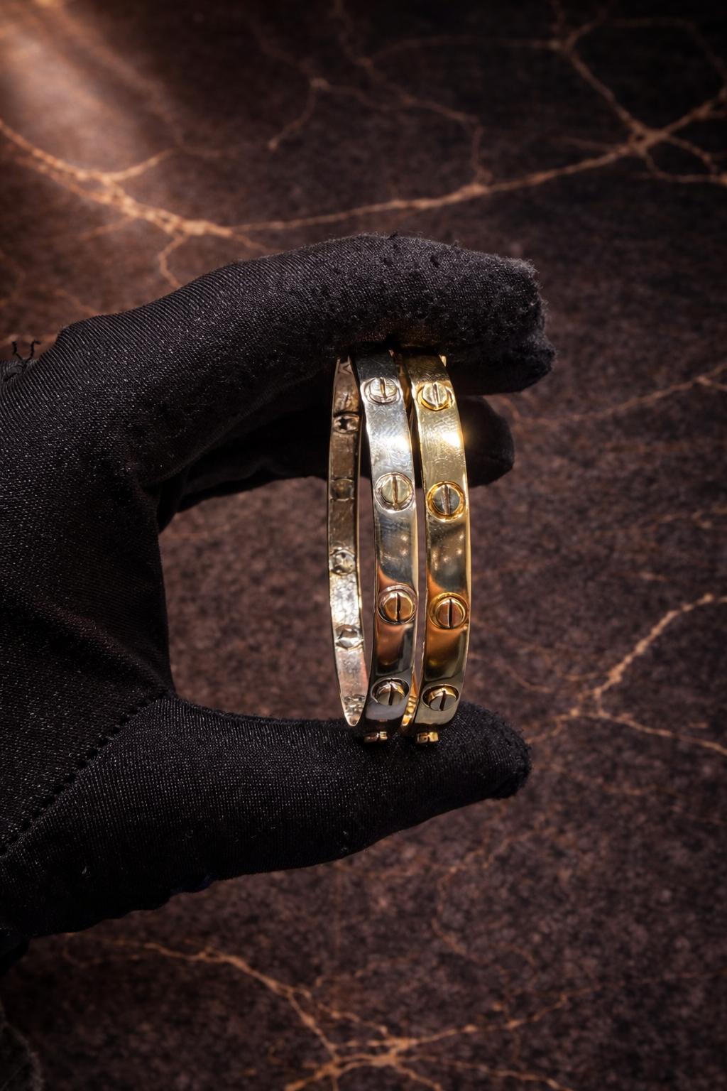 Begagnad Tvåfärgad armring i 18K guld - 2st.- 31.82g