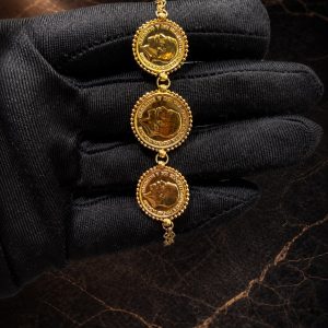Begagnade Armband med brittisk lira-motiv 21k - 4,10g